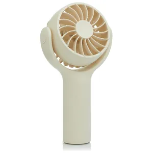 Ручной вентилятор молочного цвета